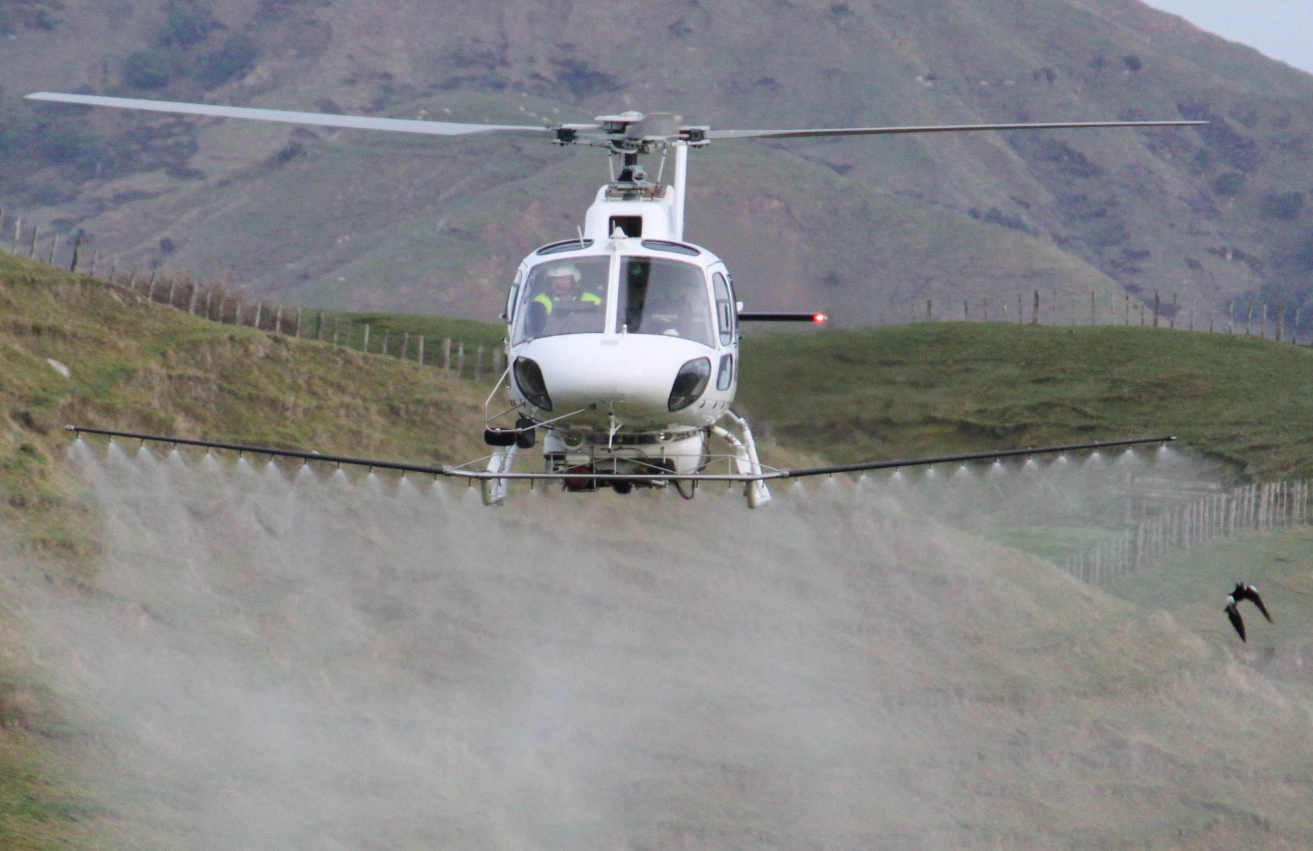 spraying helicopter